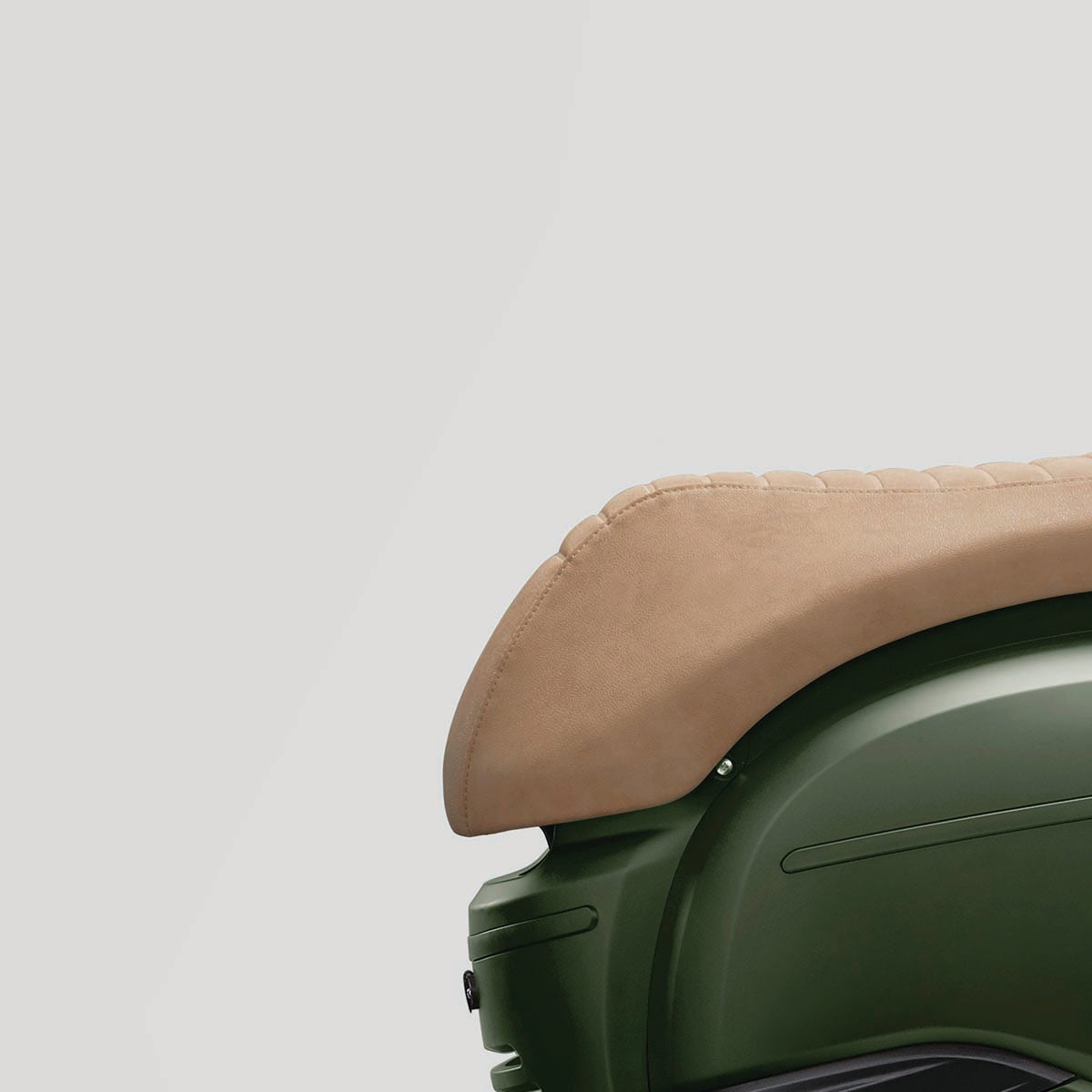 Sand Italian vegan-leather saddle on a green FONZ Arthur scooter